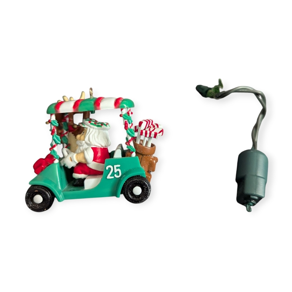 Noma Ornamotion Rotating Santa's Festive Golf Cart Ornament 1995